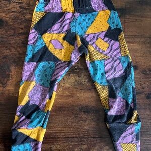 Bohovilla Vibrant Purple and Yellow Nightmare Before Christmas Leggings